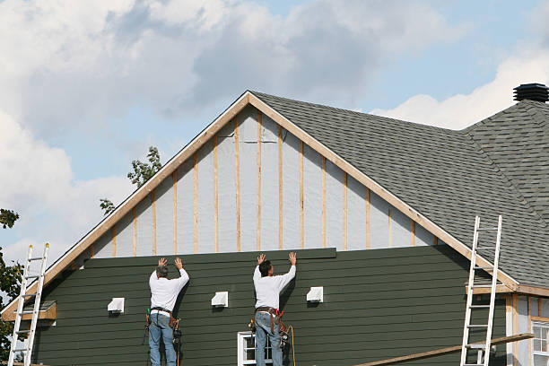 Professional Siding Contractor technician working in Brightwaters, NY